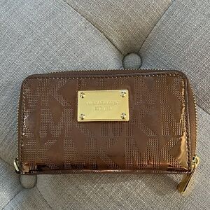 Michael Kors Wallet - like new brownish metallic color. Perfect condition.